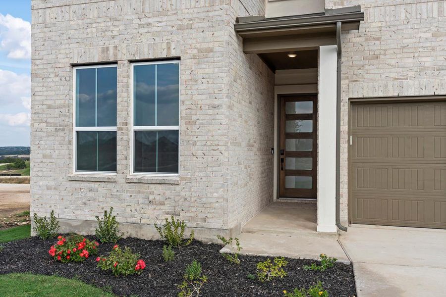 Exterior details and patio area of a home in Lariat, Liberty Hill (Image 3). Exterior details and patio area of a home in Lariat, Liberty Hill (Image 3).