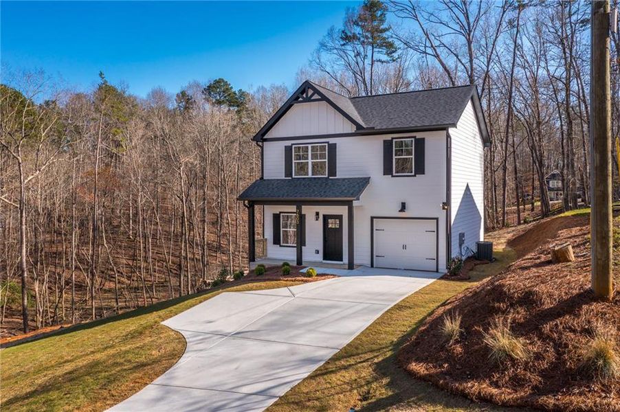 Front exterior of a new home in , Murrayville, GA, highlighting curb appeal (Image 21). Front exterior of a new home in , Murrayville, GA, highlighting curb appeal (Image 21).