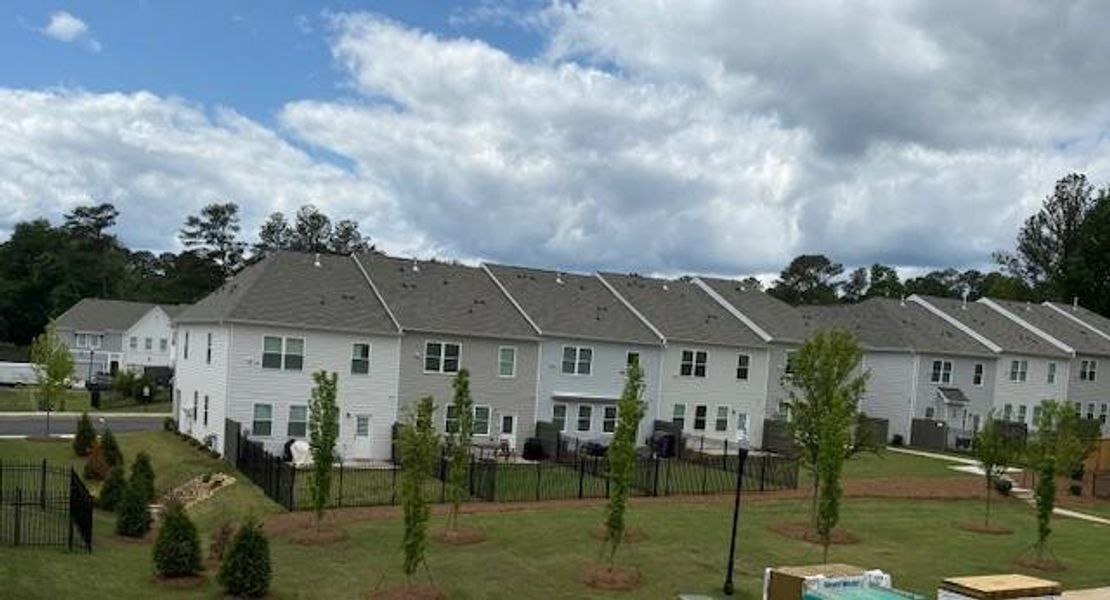 Front exterior of a new home in East Park Village, Kennesaw, GA, highlighting curb appeal (Image 33).