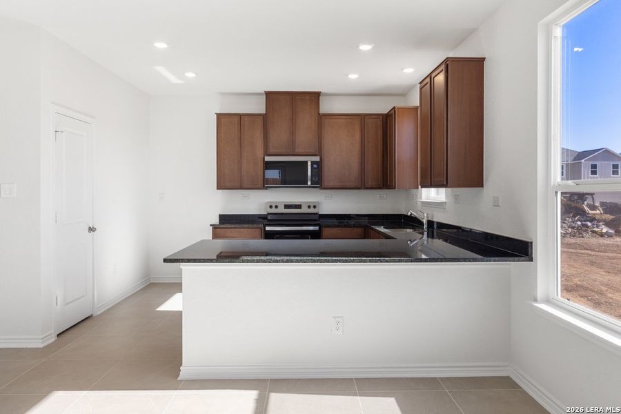 Furnished interior view inside a new home in Southton Cove, Elmendorf (Image 8).