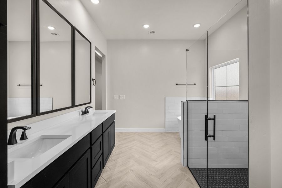 Representative furnished interior of a home built from the Pebble Beach- II by LEH. Homes in Verdancia, El Paso (Image 39).