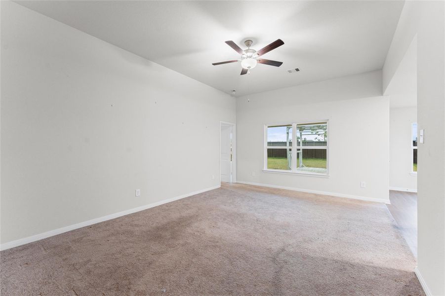 Oversized living area open to the kitchen and dining Oversized living area open to the kitchen and dining