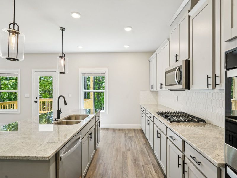 Furnished interior view inside a new home in Martin Springs - Estate Series, Lawrenceville (Image 5).