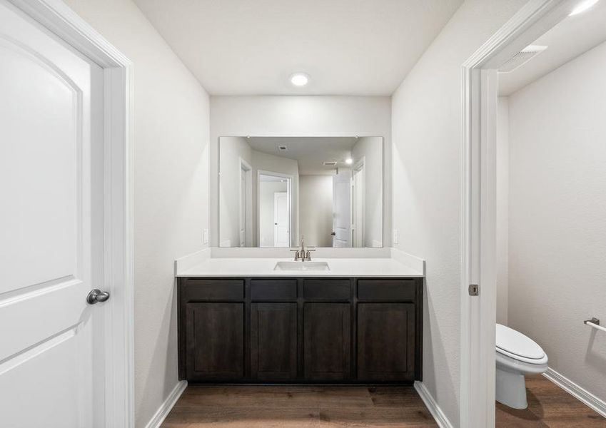 The master bathroom of the Rayburn has a vanity with plenty of counterspace.