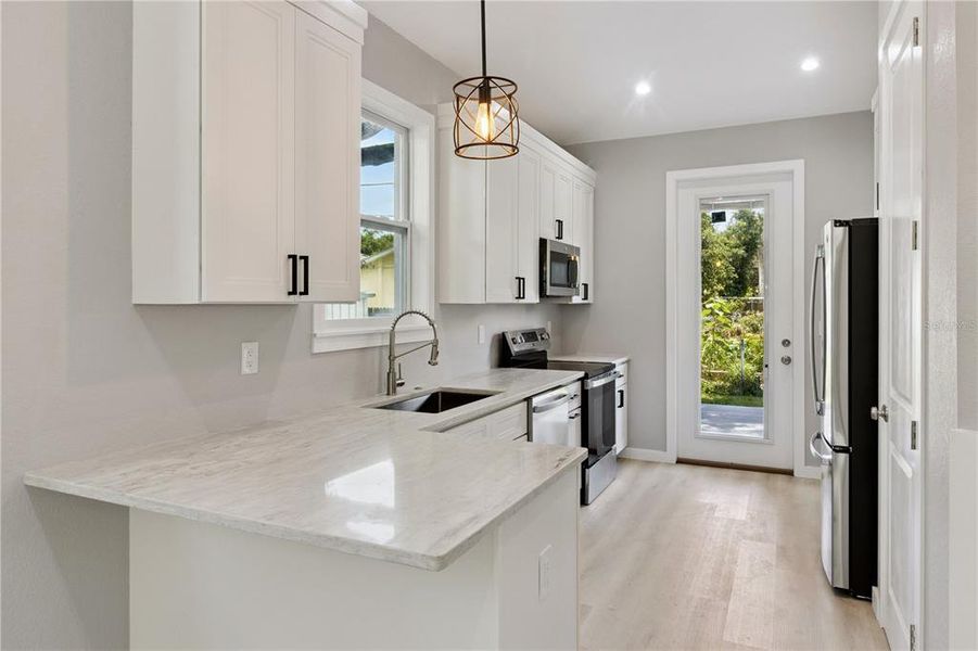 Furnished interior view inside a new home in , Gulfport (Image 6).