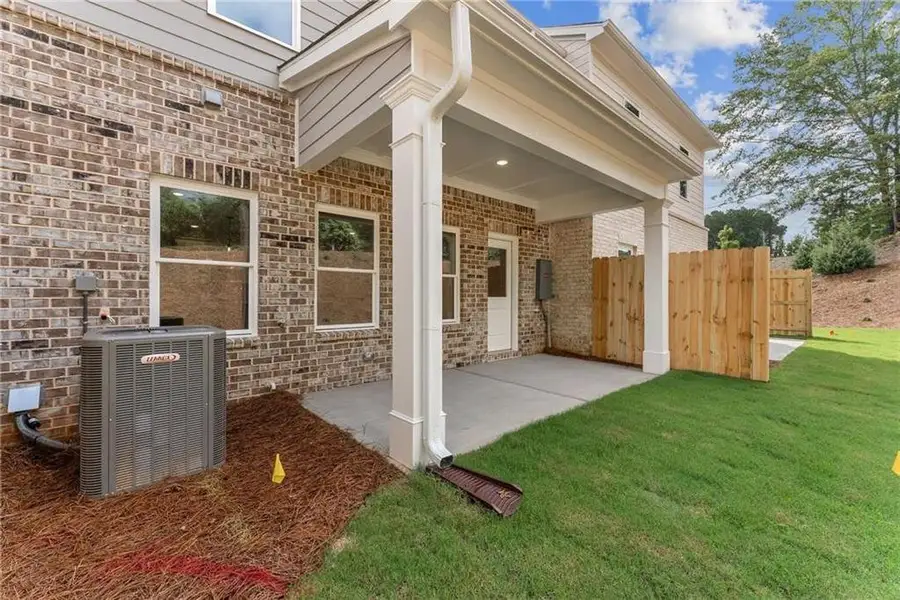 Exterior details and patio area of a home in Wilkins Walk, Mableton (Image 4).