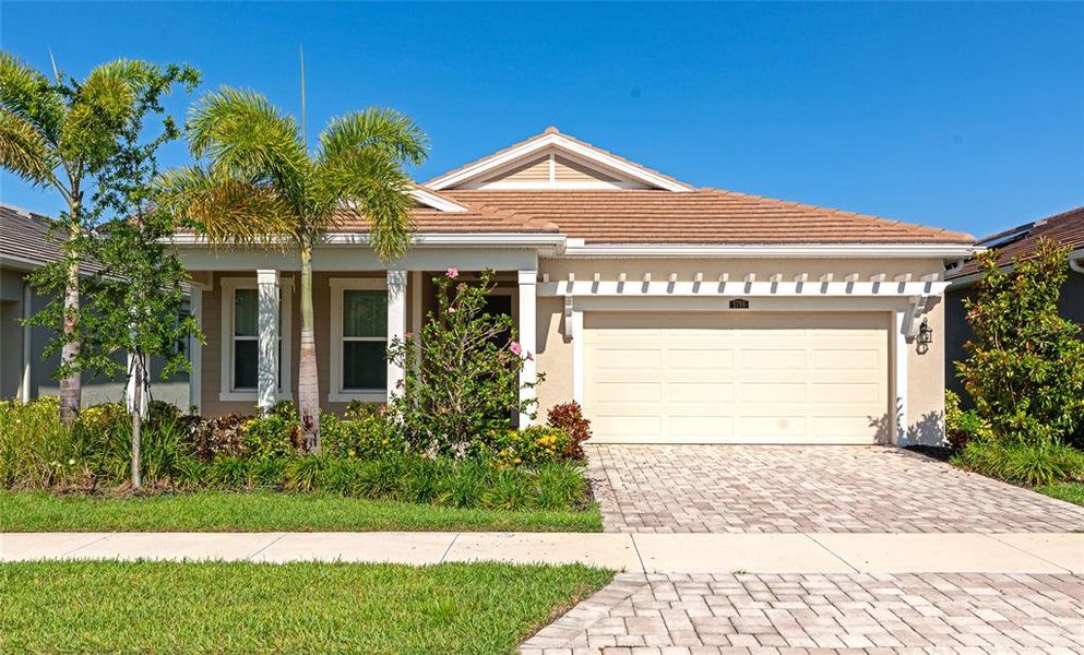 Front exterior of a new home in , Sarasota, FL, highlighting curb appeal (Image 1).