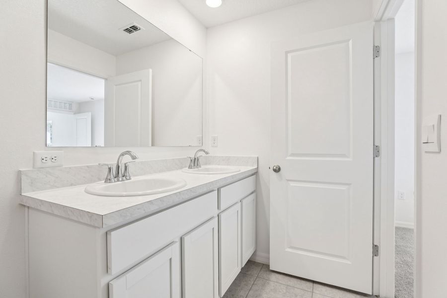 Representative furnished interior of a home built from the Poinsettia by Maronda Homes in Cape Coral, Cape Coral (Image 29).