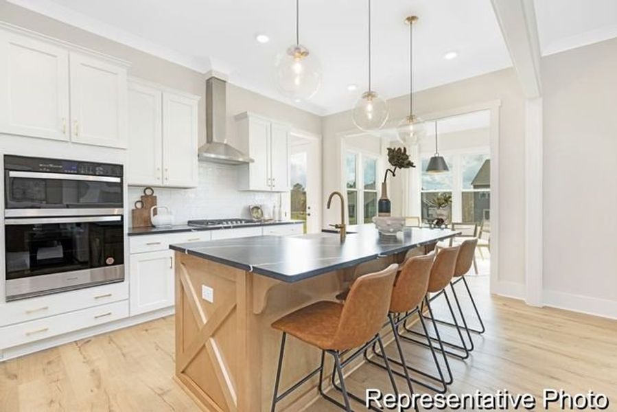 Representative furnished interior of a home built from the Bedford P by True Homes in Homecoming, Ravenel (Image 4).