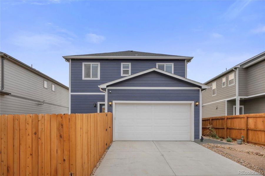 2 car attached garage with driveway for guest parking.