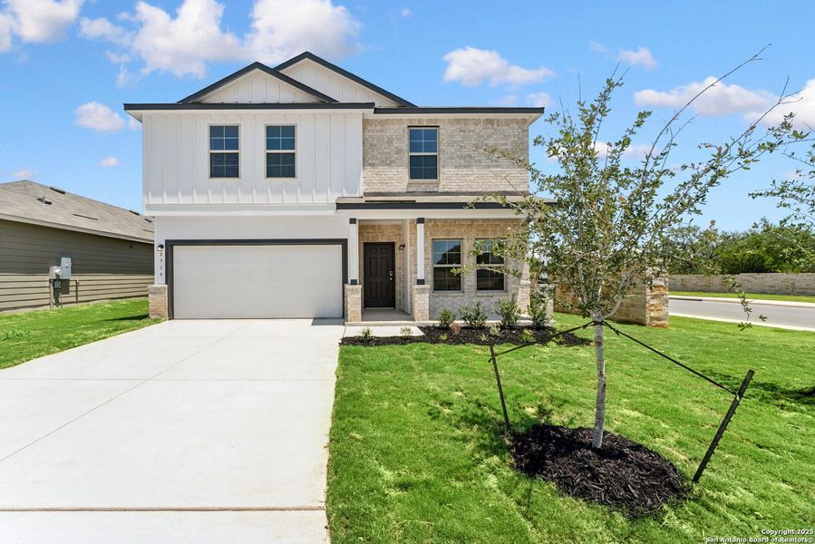 Front exterior of a new home in Cinco Lakes, San Antonio, TX, highlighting curb appeal (Image 12). Front exterior of a new home in Cinco Lakes, San Antonio, TX, highlighting curb appeal (Image 12).