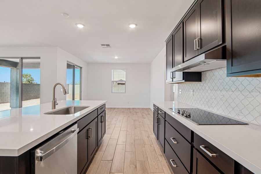 Kitchen featuring the Roosevelt Collection. Finishes and options may vary by community