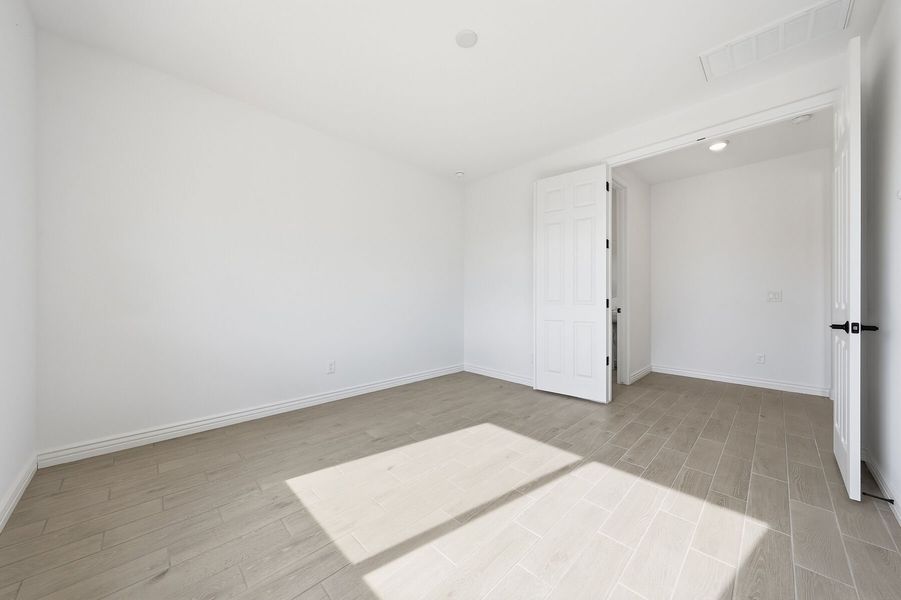 Spacious, unfurnished interior of a new home in Miravida, Surprise (Image 13).
