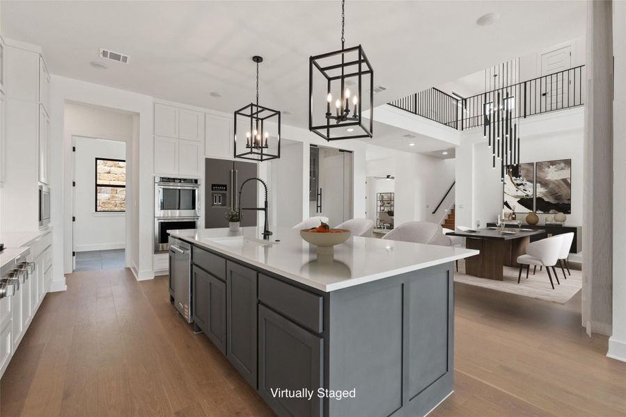 Furnished interior view inside a new home in The Estates at Rough Hollow Vista Ridge, Lakeway (Image 12).