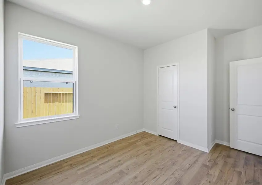 Alternate view of secondary bedroom with closet in Montgomery floor plan