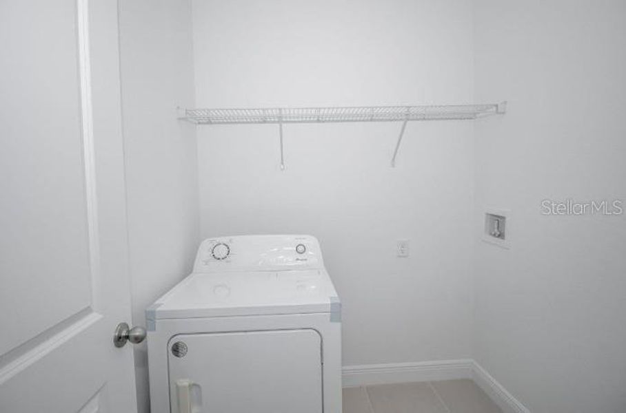 Furnished interior view inside a new home in , Dunnellon (Image 7).