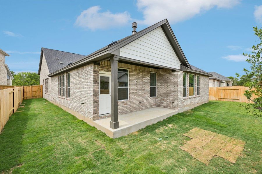 Exterior details and patio area of a home in Persimmon, Buda (Image 19).
