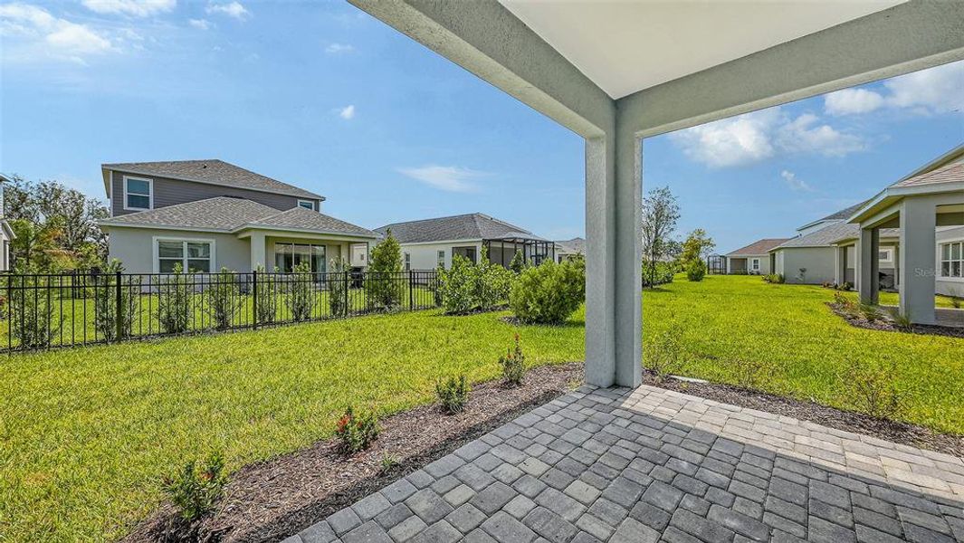 Front exterior of a new home in Wildleaf, Parrish, FL, highlighting curb appeal (Image 2).
