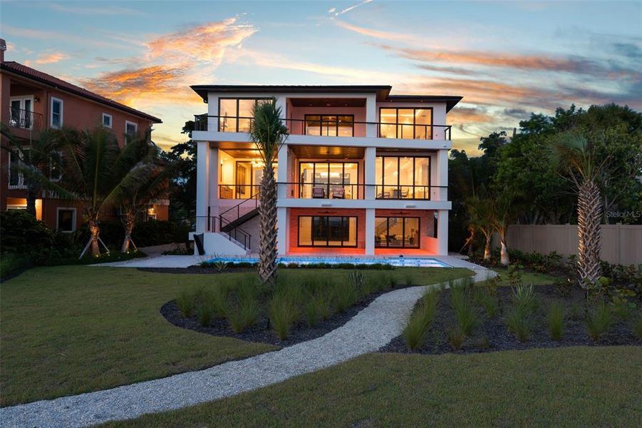 Front exterior of a new home in , Sarasota, FL, highlighting curb appeal (Image 24). Front exterior of a new home in , Sarasota, FL, highlighting curb appeal (Image 24).