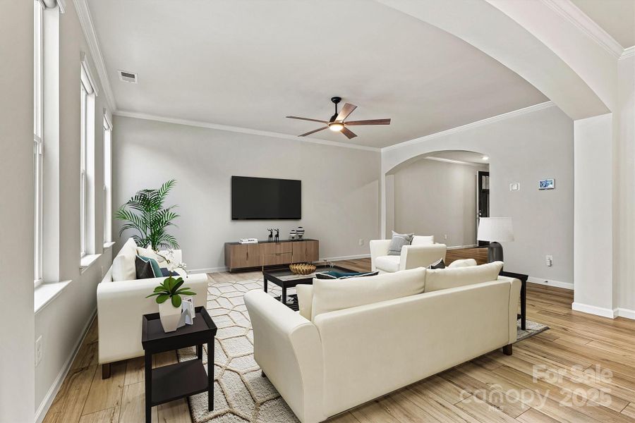 This virtually staged great room showcases an inviting, light-filled space with generous room to relax, entertain, and host gatherings—all while staying connected to the kitchen for seamless living and effortless flow This virtually staged great room showcases an inviting, light-filled space with generous room to relax, entertain, and host gatherings—all while staying connected to the kitchen for seamless living and effortless flow