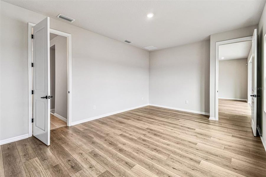 Spacious, unfurnished interior of a new home in Oakfield at Mount Dora Village Series, Mount Dora (Image 34).