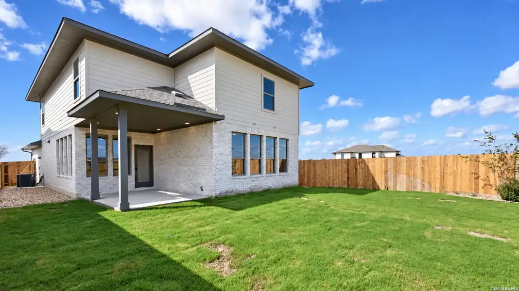 Exterior details and patio area of a home in Legacy at Lake Dunlap, New Braunfels (Image 4).