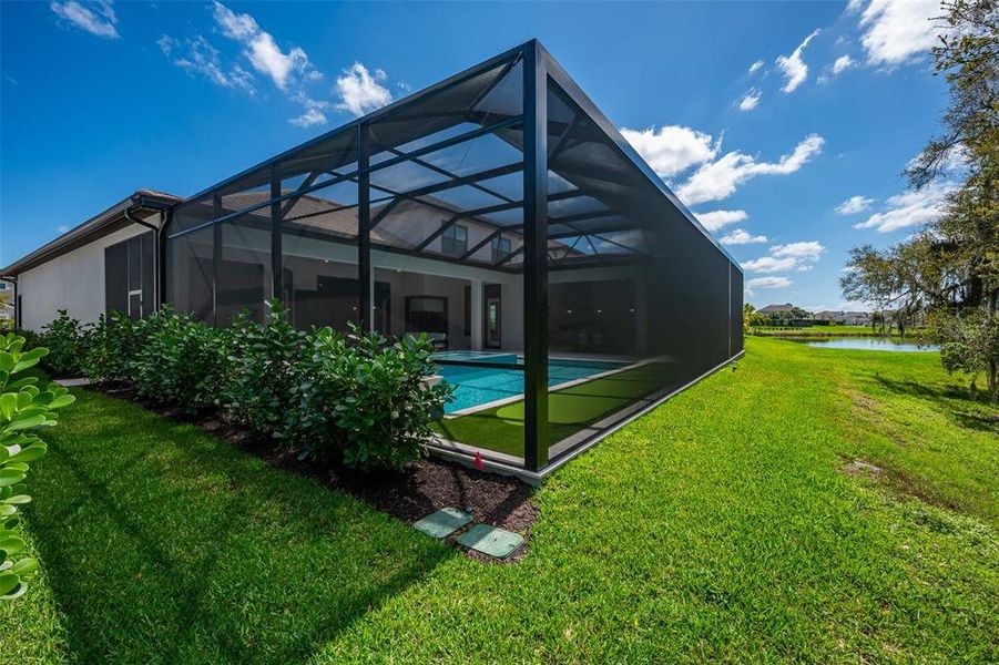 Exterior details and patio area of a home in , Sarasota (Image 38).