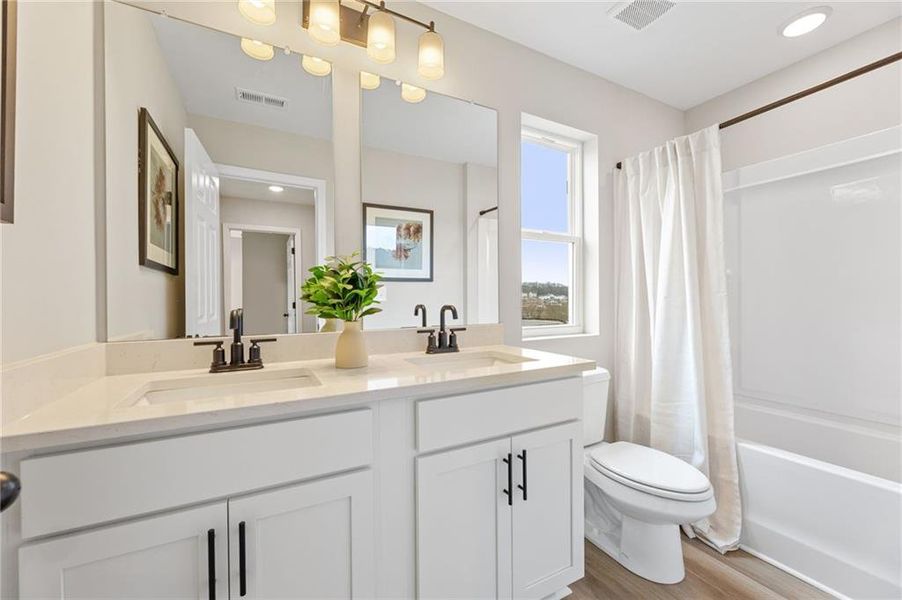 Furnished interior view inside a new home in Hemingway, Cumming (Image 11). Furnished interior view inside a new home in Hemingway, Cumming (Image 11).