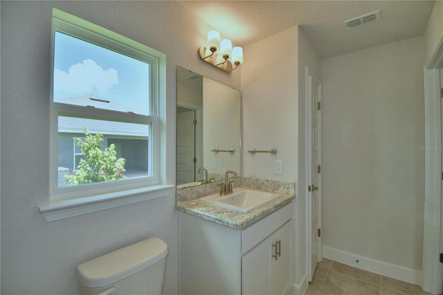 Furnished interior view inside a new home in Cadence Crossing, Auburndale (Image 12).