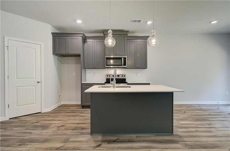 Furnished interior view inside a new home in Enclave at Evergreen, Fairburn (Image 3).