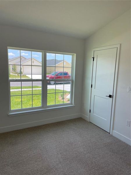 Spacious, unfurnished interior of a new home in Harmony Central, St. Cloud (Image 11).