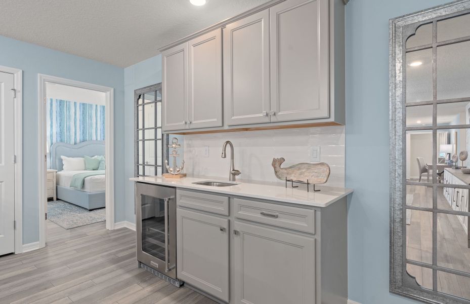 Representative furnished interior of a home built from the Baymont by Pulte Homes in Windsor Cay Resort, Clermont (Image 22).