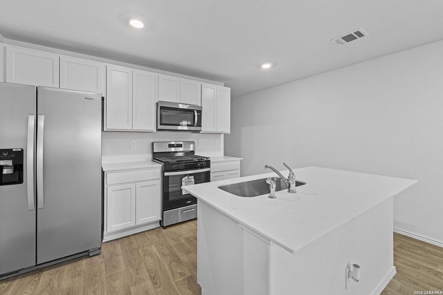 Furnished interior view inside a new home in Hickory Ridge, Elmendorf (Image 11).