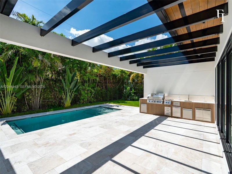 Exterior details and patio area of a home in , Coral Gables (Image 32). Exterior details and patio area of a home in , Coral Gables (Image 32).