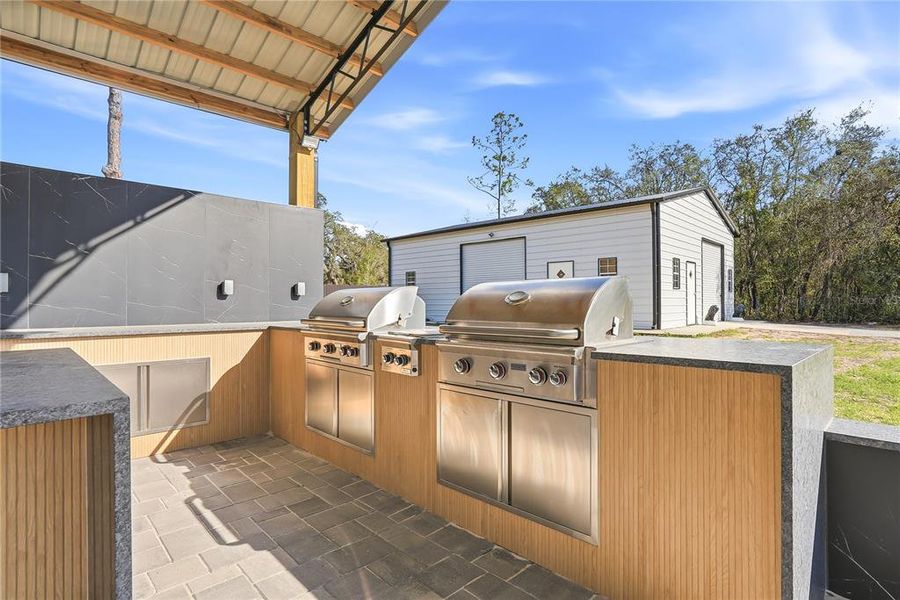 Exterior details and patio area of a home in , Spring Hill (Image 24).