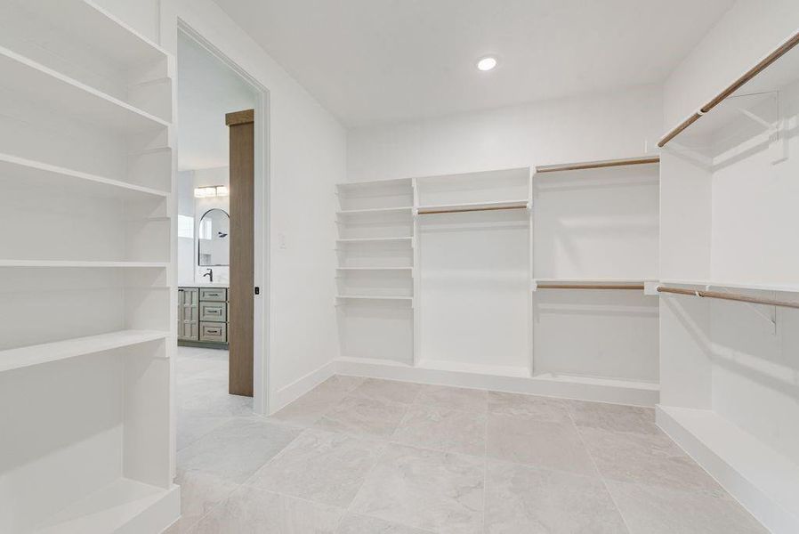 Primary walk in closet Primary walk in closet