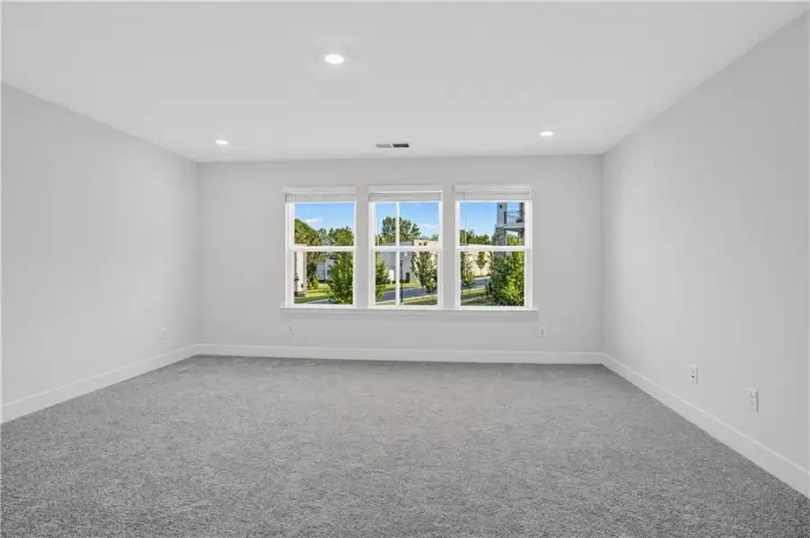 Spacious, unfurnished interior of a new home in Towns at Holly Springs, Holly Springs (Image 29).