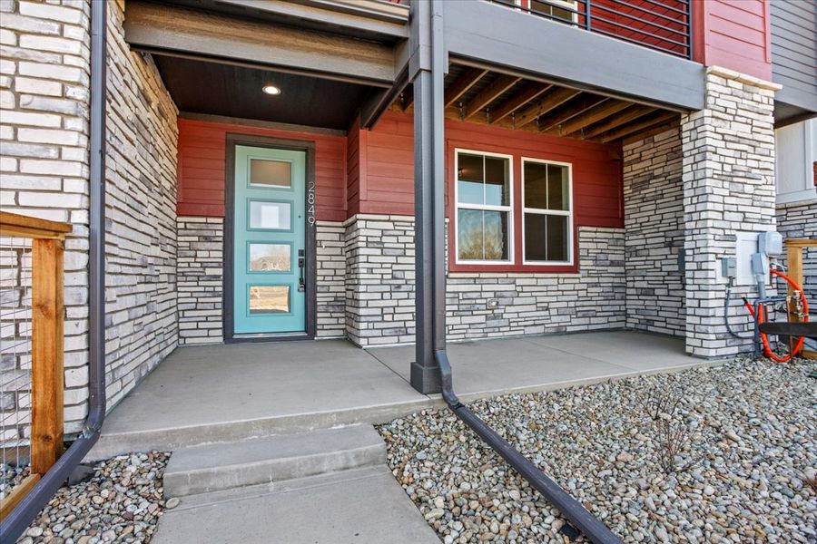 Front exterior of a new home in Arras Park, Thornton, CO, highlighting curb appeal (Image 19).