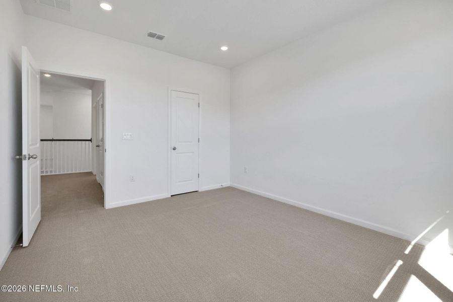 Spacious, unfurnished interior of a new home in Brook Forest, St. Augustine (Image 14).