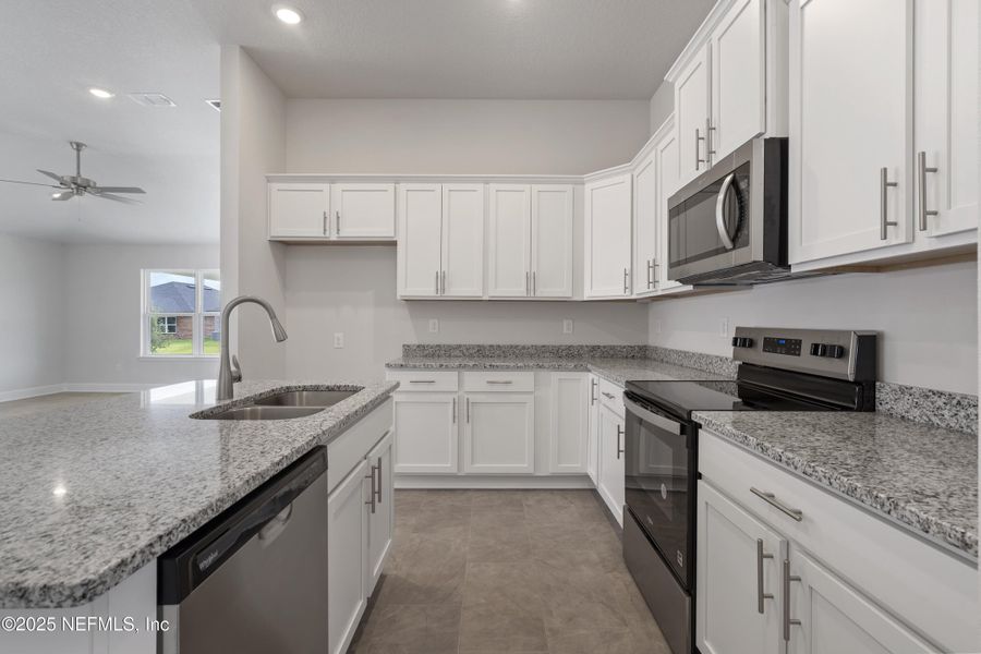 Furnished interior view inside a new home in Shadow Crest at Rolling Hills, Green Cove Springs (Image 6).