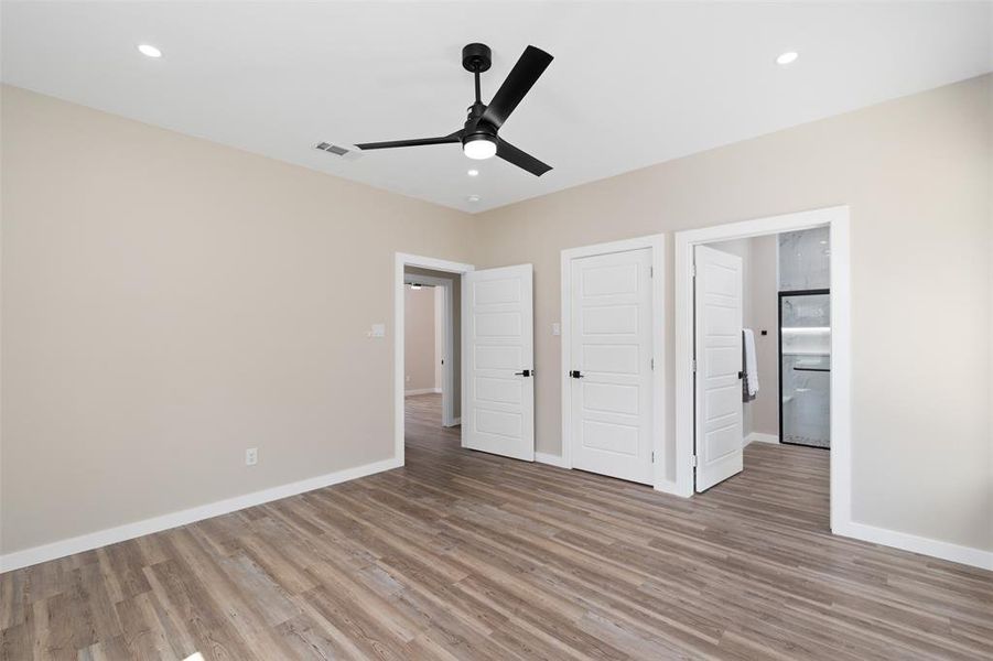 Unfurnished bedroom with light wood finished floors, recessed lighting, and ceiling fan