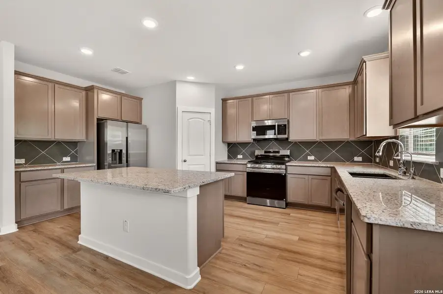 Furnished interior view inside a new home in Trilogy Grove, San Antonio (Image 5).
