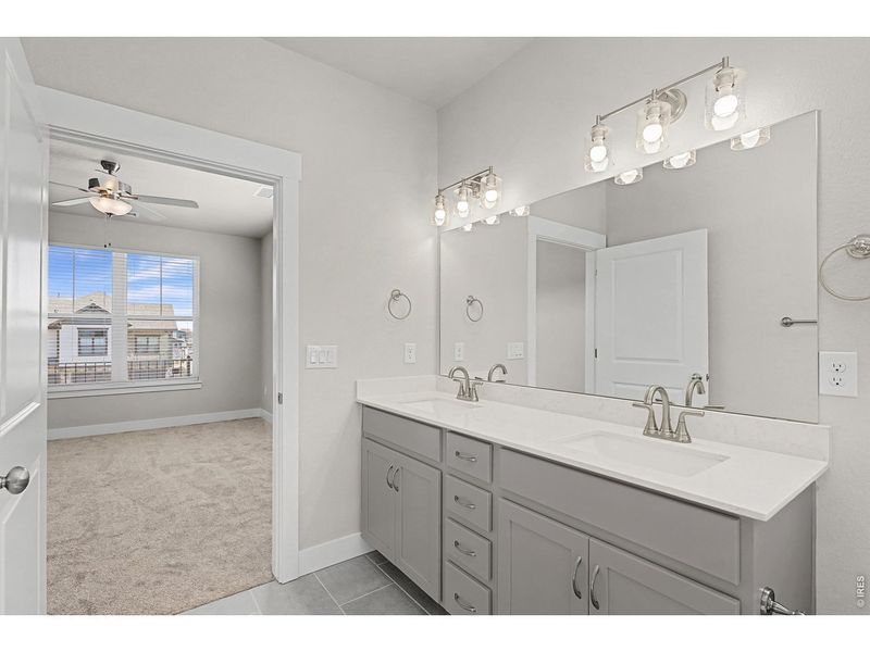 Furnished interior view inside a new home in Highlands at Fox Hill - The Flats, Longmont (Image 6).