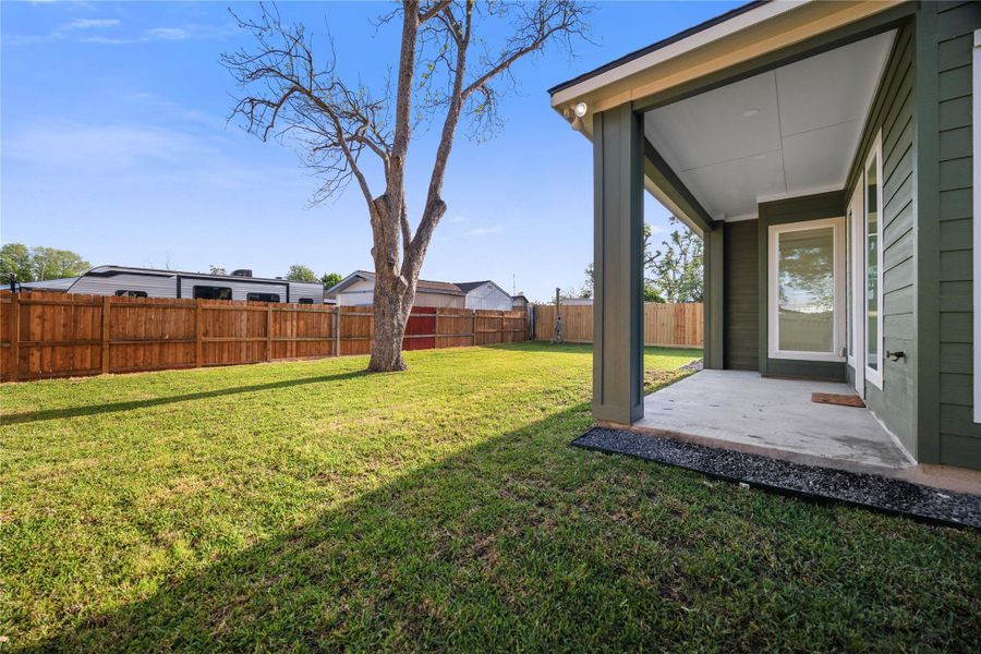 Exterior details and patio area of a home in , Houston (Image 3).