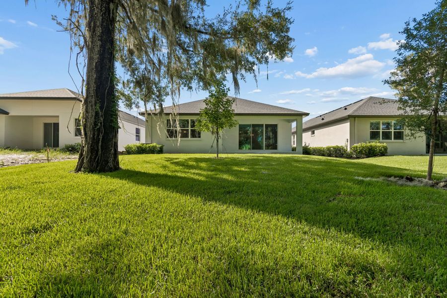 Exterior details and patio area of a home in Southern Hills Plantation, Brooksville (Image 25).