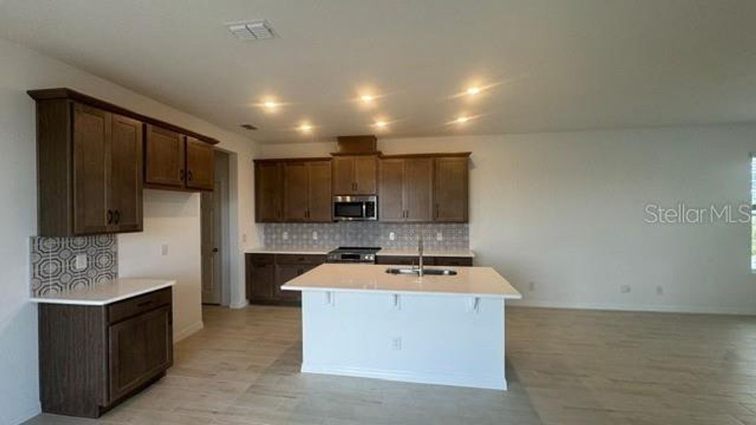 Furnished interior view inside a new home in Cypress Bluff, Groveland (Image 3).