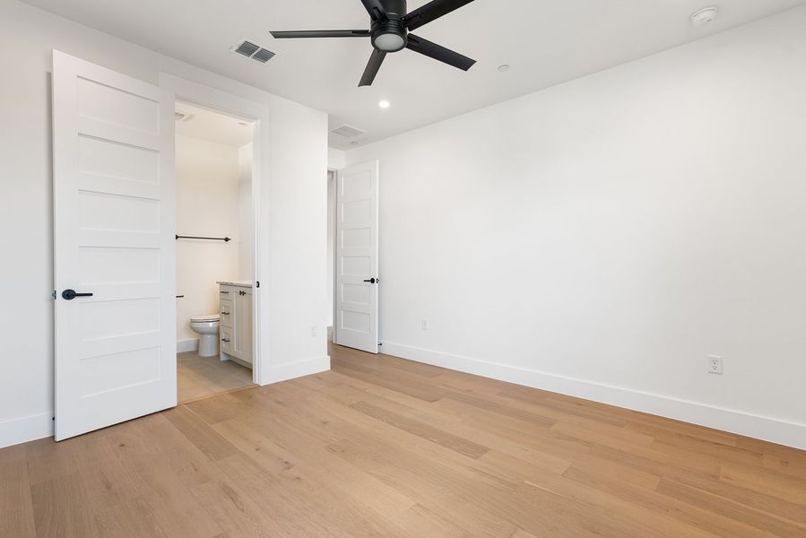 Spacious, unfurnished interior of a new home in Milky Way at River Place, Austin (Image 23).