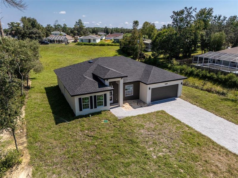 Front exterior of a new home in , Ocala, FL, highlighting curb appeal (Image 22).