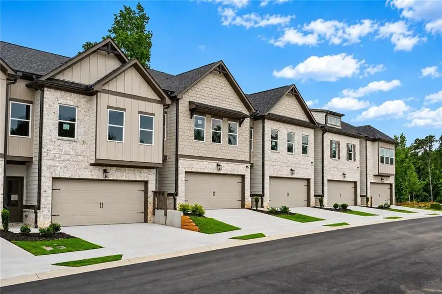 Front exterior of a new home in , Norcross, GA, highlighting curb appeal (Image 1). Front exterior of a new home in , Norcross, GA, highlighting curb appeal (Image 1).