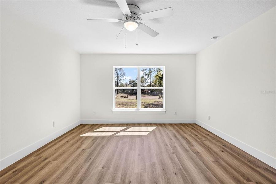 Spacious, unfurnished interior of a new home in , Dade City (Image 38).